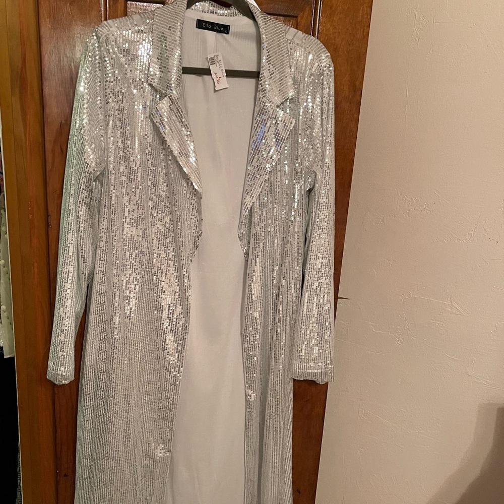 Gorgeous sequin duster. Brand new and ready to go home with you.